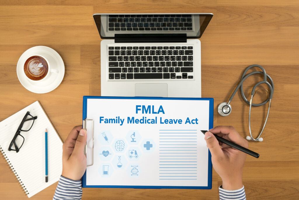 FMLA family medical leave act, FMLA computer clipboard glasses stethoscope